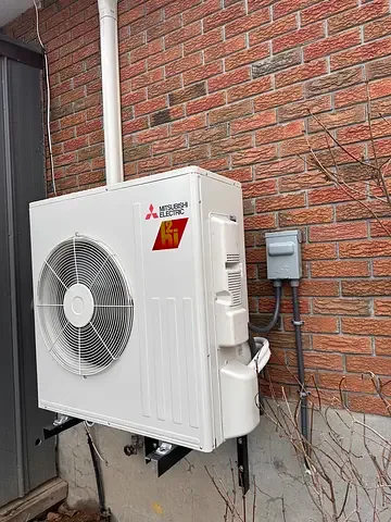 Air conditioning condenser unit installation detail by Burt’s Breeze