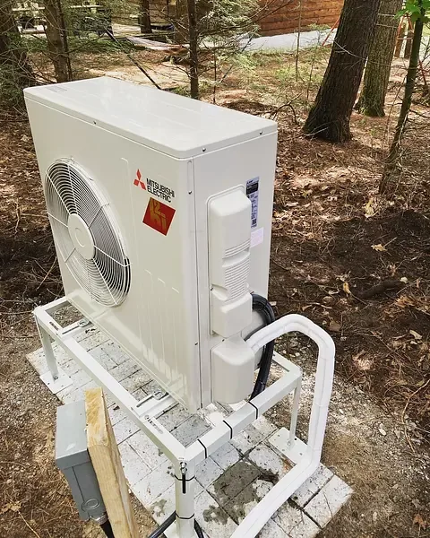 Burt's Breeze technician's completed heat pump installation at an Ontario home