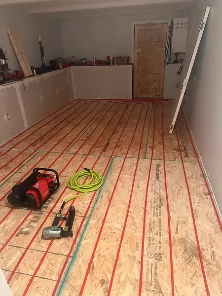 In-floor radiant heating installation by Burt’s Breeze
