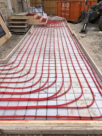 Snow melt and radiant heating manifold work by Burt’s Breeze
